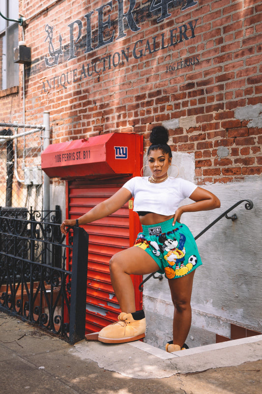 hip hop artist Ashanti wearing Wheats sneaker slipper