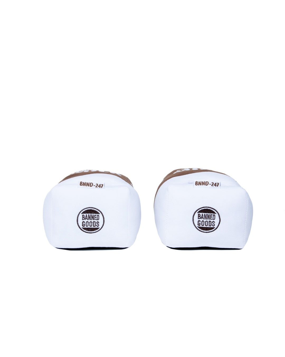 A pair of plush slippers with brown trim and a circular black and white 'BAND-FOODS' logo on the front, set against a plain white background.