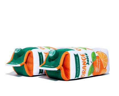  orange juice themed plush slipper arranged in a row on a plain white background.
