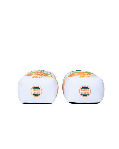 A pair of plush slippers shown from the rear, featuring orange and green graphics on the deck tops and circular 'Banned Goods' logos on the backplates.